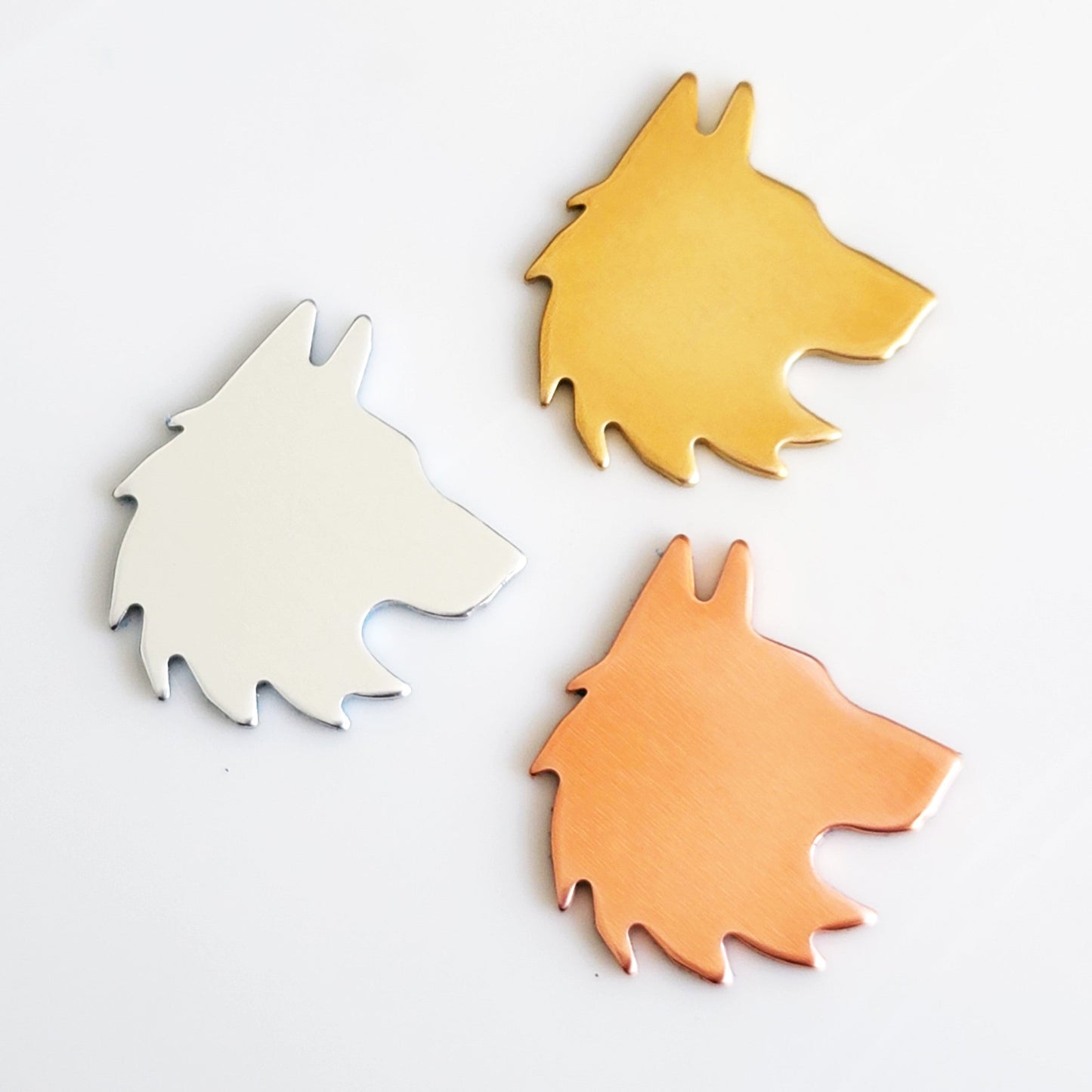 1 1/4" x 1 3/8" Wolf Heads - 14g COPPER