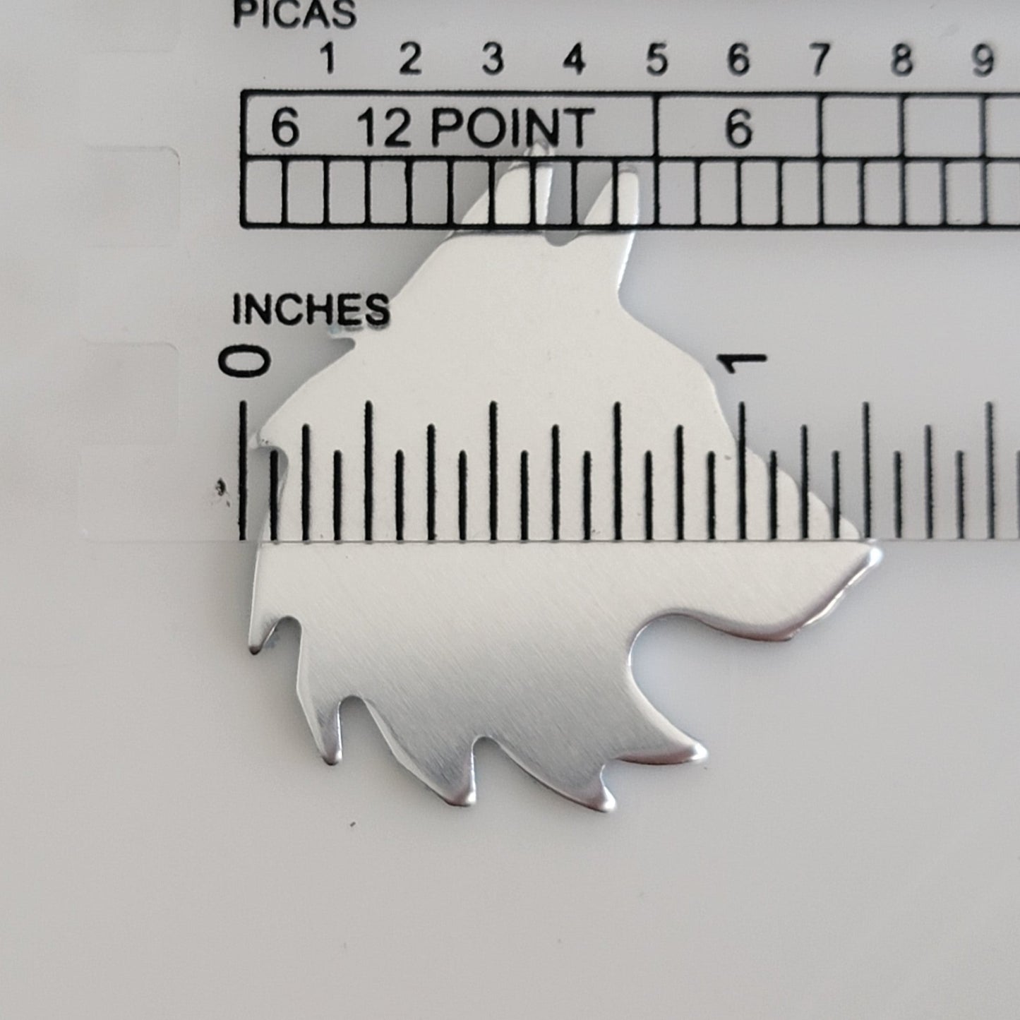 1 1/4" x 1 3/8" Wolf Heads - 14g BRASS